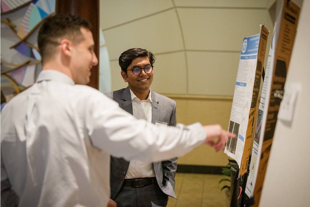 Prithwi (right) learning from a poster